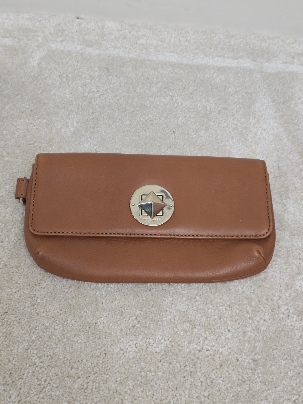 kate spade Leather Wristlet in Cognac Brown with Gold-Tone Emblem